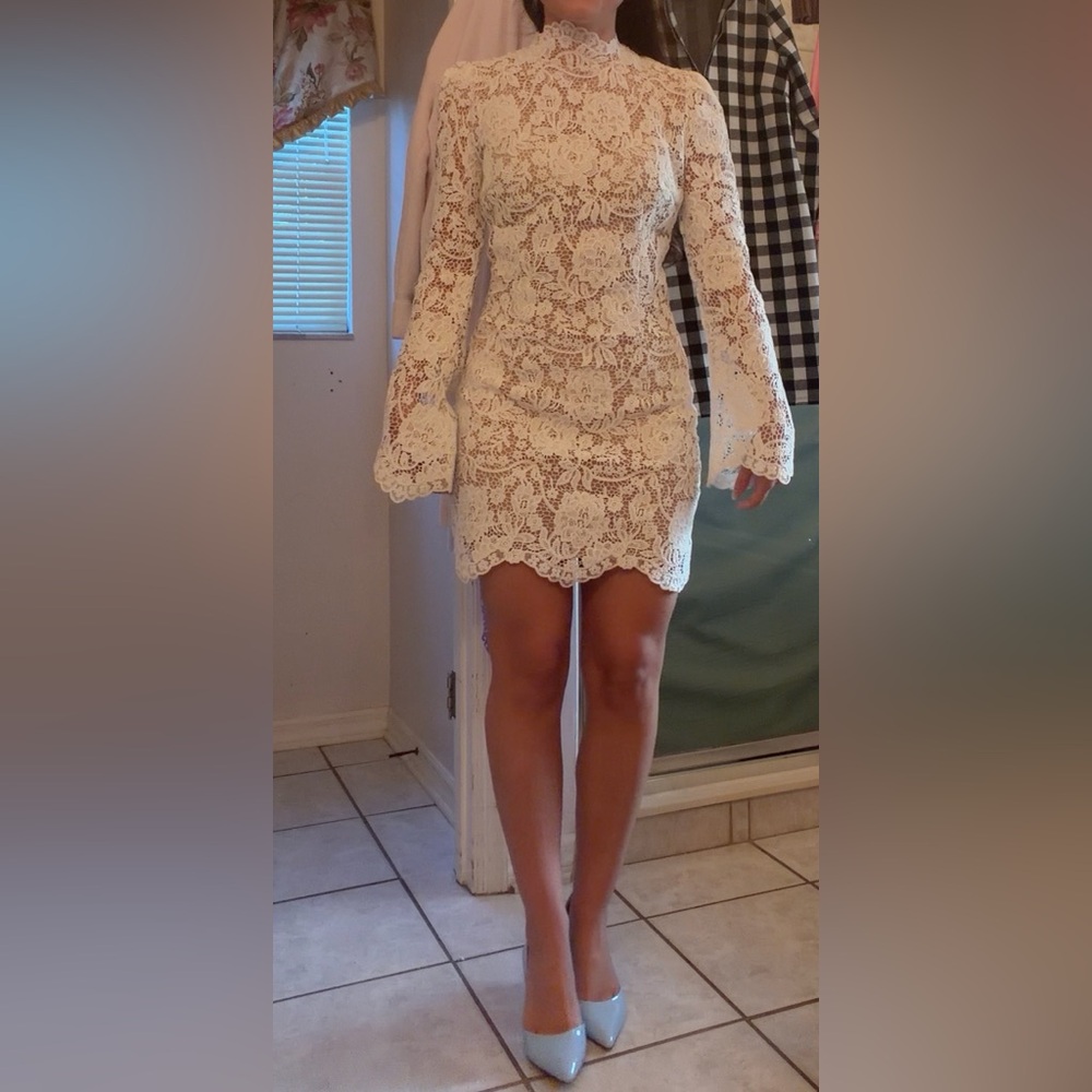 x REVOLVE Noosa Mini Dress in Ivory
Stone Cold Fox